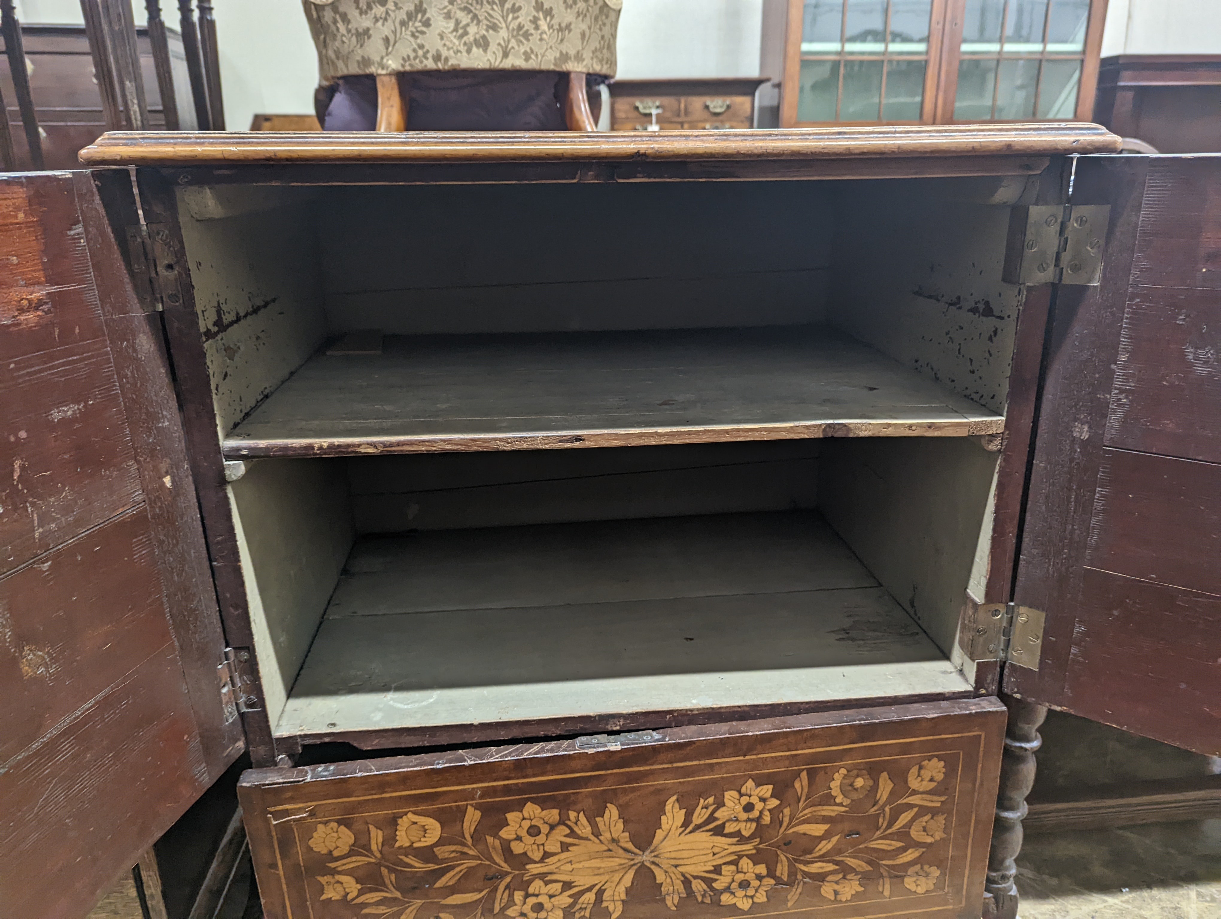 An 18th century Dutch floral marquetry walnut cabinet (altered), width 70cm, depth 48cm, height 87cm